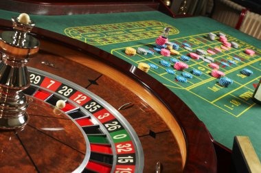 Jewels of Prosperity slot interface on mobile showing five reels with gem symbols and stake controls